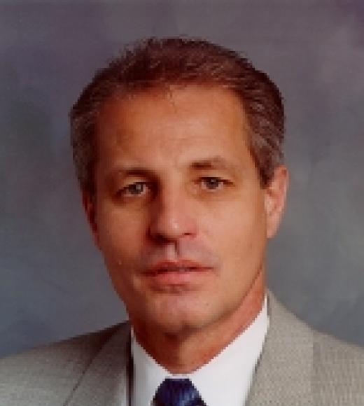 Dr. Mark A Matthews